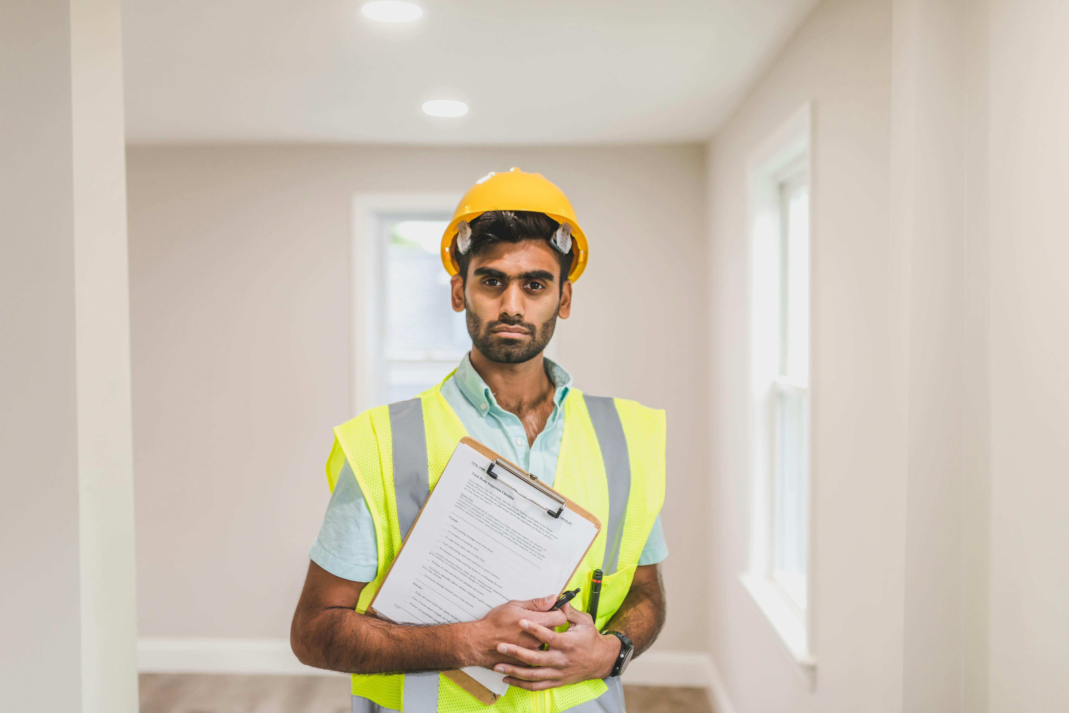Inspector with clipboard in a home